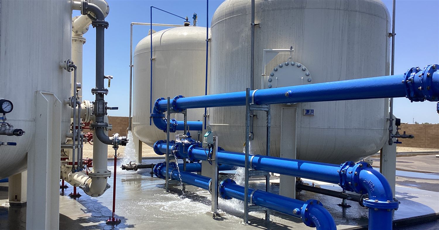 Municipal water treatment facility with filtration tanks and piping